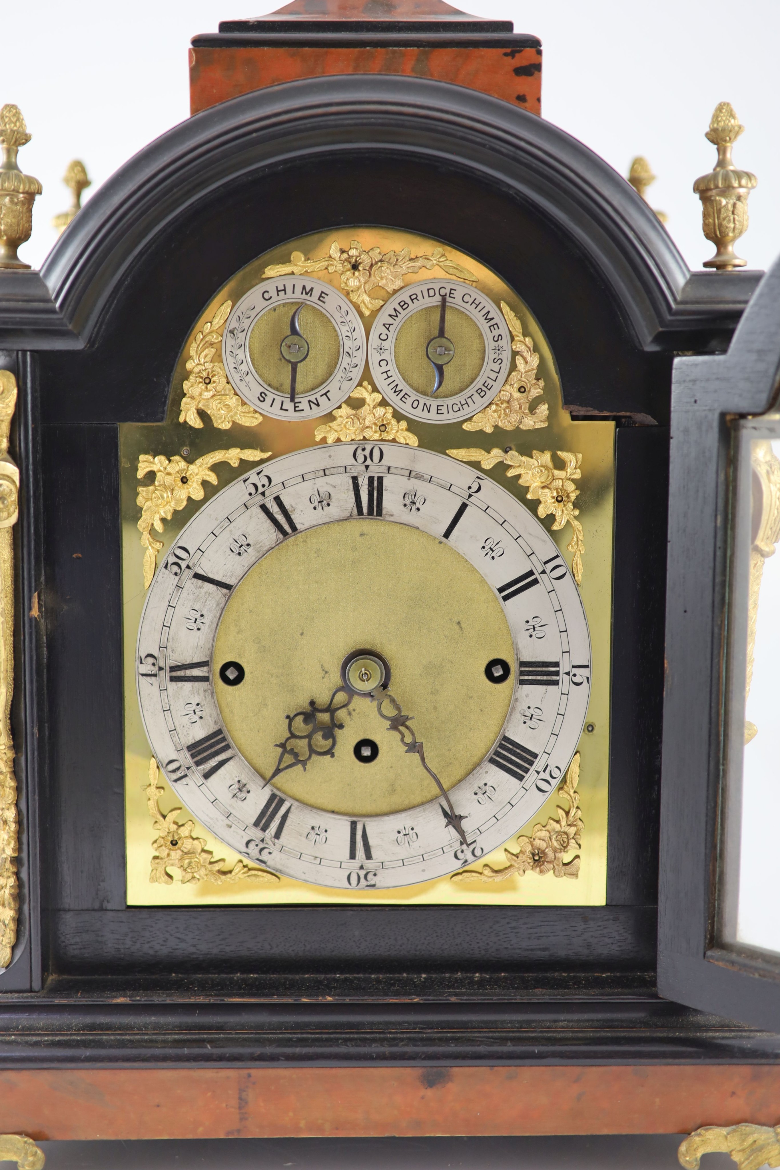 A late Victorian faux tortoiseshell and ebonised mantel clock 48cm high, 35 x 21cm
